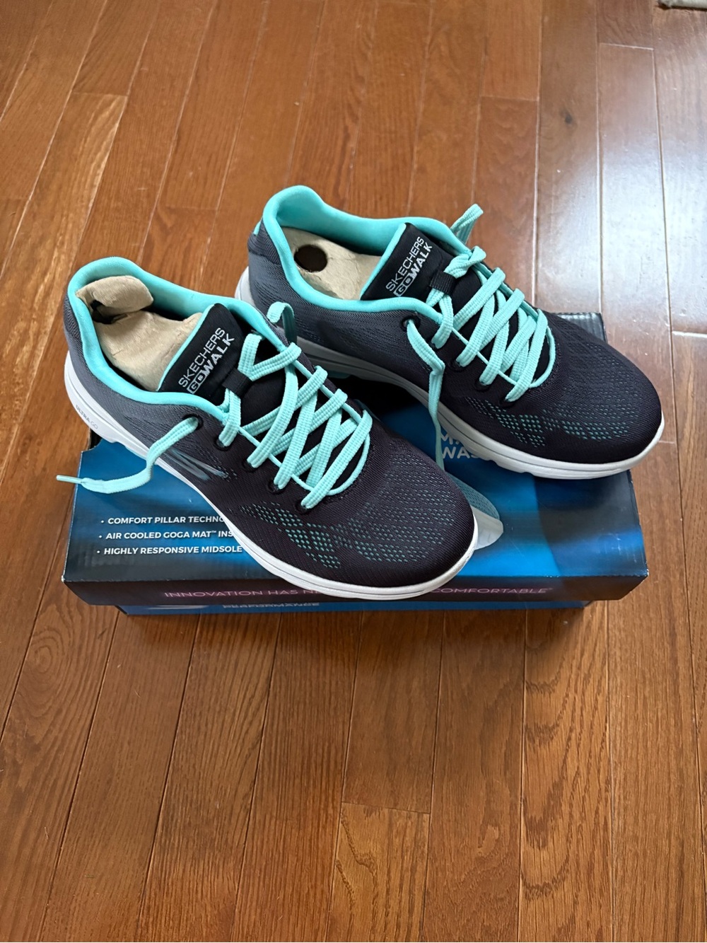 Skechers Women's Black Sneakers with Teal Accents